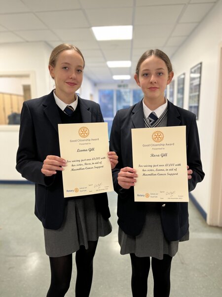 Image of KGS siblings, Leoma and Rosa, presented with their Rotary Good Citizenship Awards